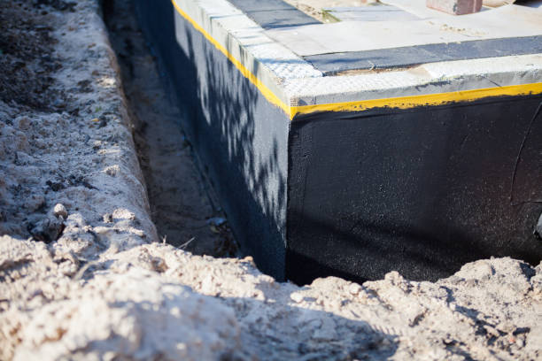 Professional Waterproofing technician working in Glen Echo, MD